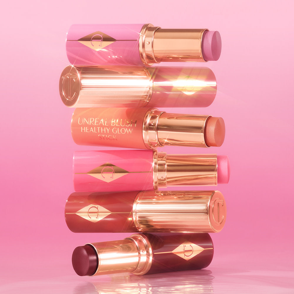 Charlotte Tilbury 
Unreal Lip + Cheek Glow Blush Stick with Hyaluronic Acid