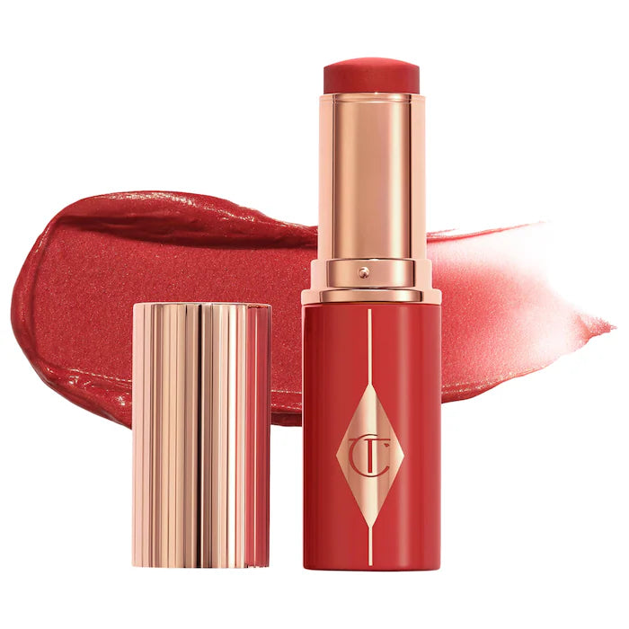 Charlotte Tilbury 
Unreal Lip + Cheek Glow Blush Stick with Hyaluronic Acid